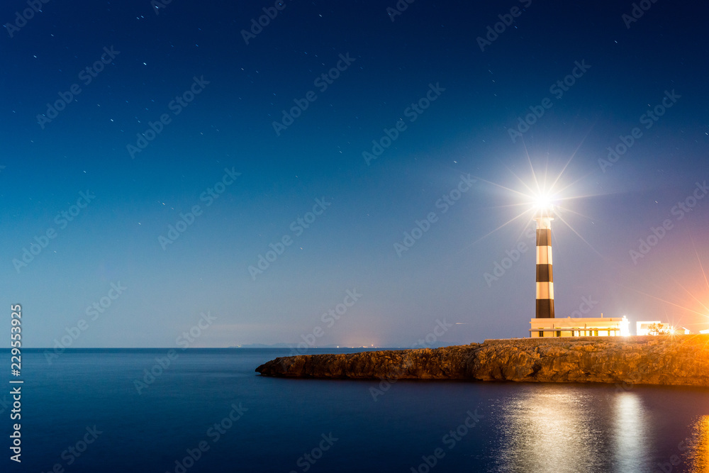Artrutx Lighthouse in Minorca, Spain. - obrazy, fototapety, plakaty 