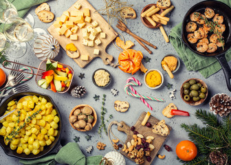 Wall Mural - Christmas dinner party table, holiday vegeterian food concept background, top view, flat lay