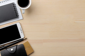 Wall Mural - The concept of online shopping. Composition with discount cards phone and notebooks on the background of the table