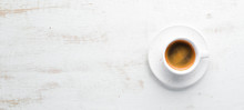 Espresso Coffee On A Wooden Background. Top View. Free Copy Space.