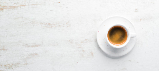 Espresso coffee On a wooden background. Top view. Free copy space.