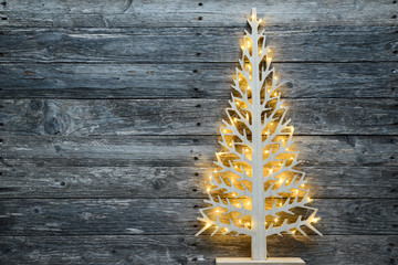 Wall Mural - christmas wooden tree natural decoration ornament and copyspace on old wood board