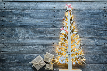 Wall Mural - christmas wooden tree natural decoration ornament and copyspace on old wood board