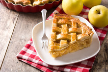 Homemade Apple Pie Slice On Wooden Table