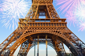 detail of eiffel tower pillars with fireworks, paris, france