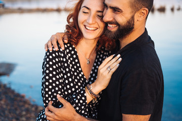 happy young couple posing at the camera