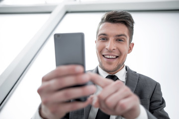 businessman reading a text message