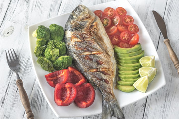 Wall Mural - Grilled sea bream fish with vegetables