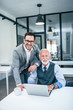 © bnenin - Portrait of two successful business men.