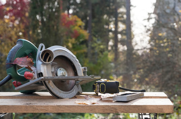 Poster - A set of tools for construction and repair, for carpenters. Circular saw.