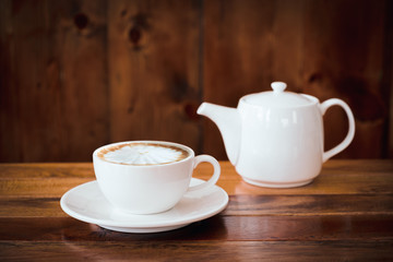 A cup of coffee on table in cafe