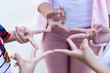 © Joke Phatrapong - close up of hands children with teacher making gesture connecting to star shape together or Stars mark made by a finger. abstract ,symbol or Volunteer Teamwork ,Partnership and people concept