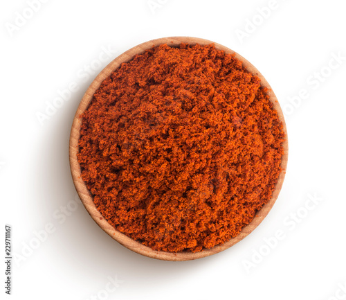 Fotografía Red paprika powder isolated on white background. Top view
