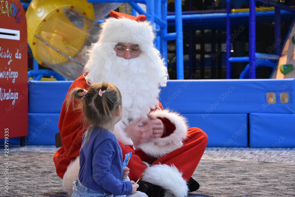Święty Mikołaj z dziećmi - obrazy, fototapety, plakaty 
