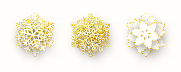 Wall Mural - vector set of 3 white and gold christmas paper cut 3d snowflakes with shadow isolated on white backg