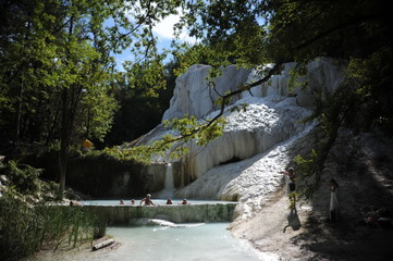 hot spring in Bagni San Filippo thermal center into the wilds of the forest in tuscany, italy