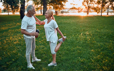 Wall Mural - Senior couple doing sport outdoors