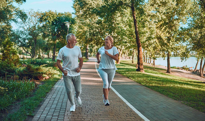 Senior couple doing sport outdoors