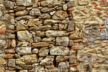 rough abstract texture of a stone wall for a background closeup