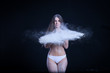 © elvira_gumirova - sporty young girl throws flour on black background
