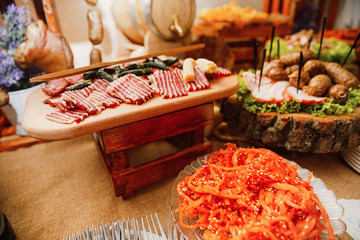 Wall Mural - Catering banquet table with different food snacks and appetizers