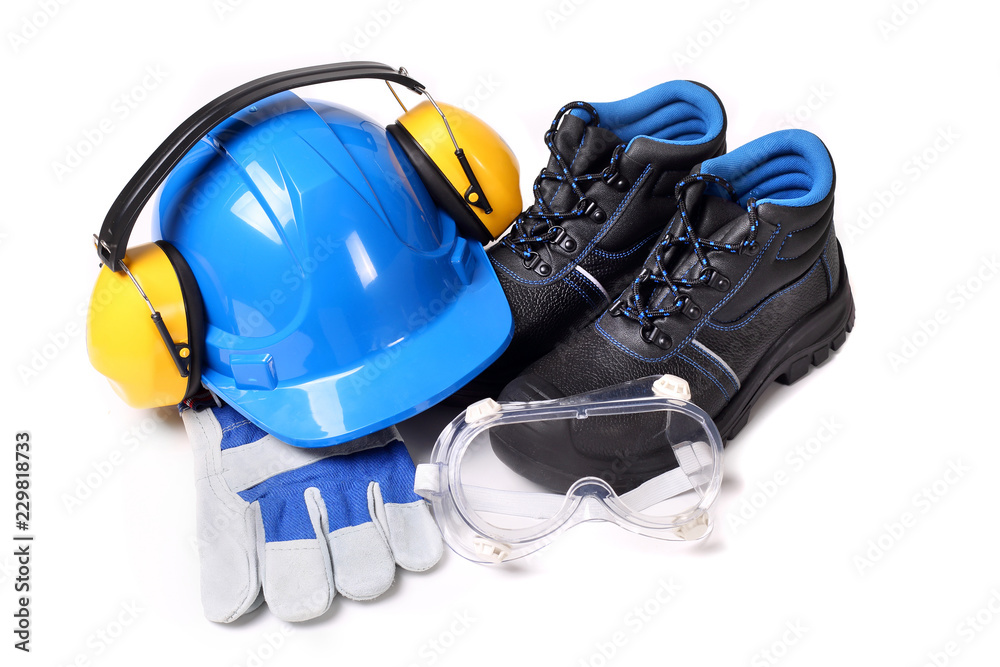 Zestaw dla pracownika zawierający niebieski hełm ochronny buty ochronne rękawice robocze i gogle przeciwodpryskowe - obrazy, fototapety, plakaty 