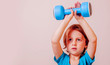 © zwiebackesser - Strong child girl lifting dumbbells as symbol of sport lifestyle, health, powerand fitness.