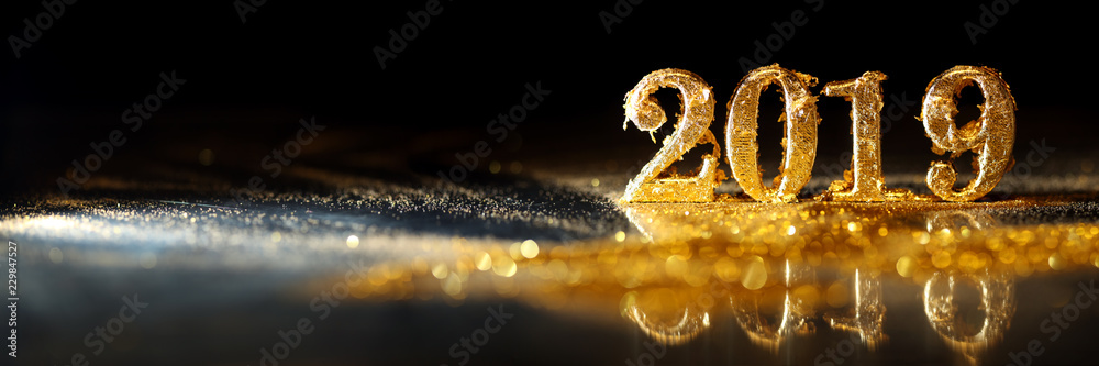 2019 in sparkling gold numbers celebrating the New Year - obrazy, fototapety, plakaty 