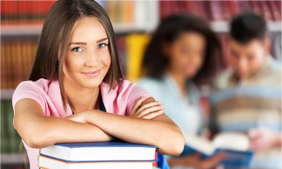 Portrait of a cute young student girl