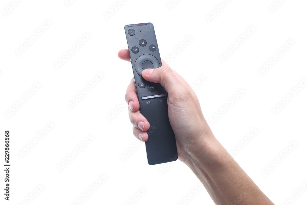 Hand holds tv remote isolated on white background. Stock Photo | Adobe ...