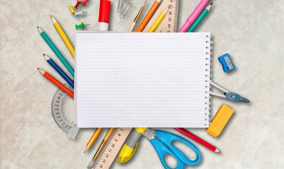 Wall Mural - Colorful school supplies on white background