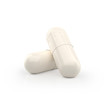 Two capsules supplement on white background. 3d pill isolated.