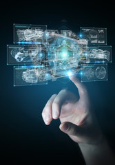 Poster - businesswoman using wireframe holographic 3d digital projection of an engine