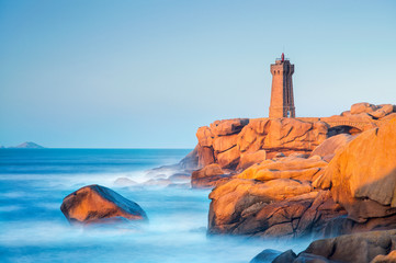 Wall Mural - colore sea scape with rocks and lighthouse in Bretagne in France