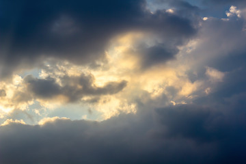 Sunset blue sky with clouds nature background with light reflection.