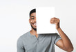 © Prostock-studio - African-american man covering half of his face with clean paper