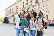 Multiracial Friends Tourists Making Selfie In City