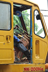 Wall Mural - Operator operate his crane from the crane driver cabin. 