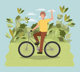 Wall Mural - young man in bicycle on park