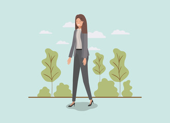 Wall Mural - elegant businesswoman walking in the park