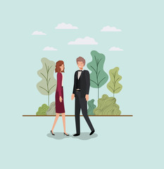 Wall Mural - elegant business couple walking in the park