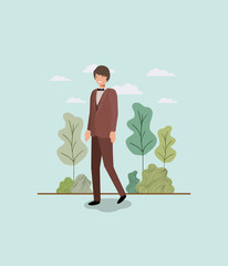 Wall Mural - elegant businessman walking in the park