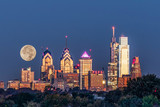 Fototapeta Nowy Jork - Full Moon setting behind Philadelphia 