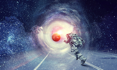 Wall Mural - running spaceman and galaxy. mixed media