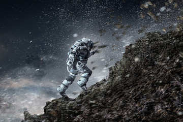 Wall Mural - Spaceman running fast. Mixed media