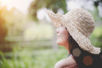 Close up smiling woman traveler with a enjoy photography, travel girl outdoors. Woman are happy with taking photos with a vacation camera.