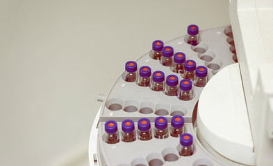Wall Mural - vials are arranged in the auto sampler for gc chromatography in checmical laboratory