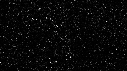 Wall Mural - white snow falling on isolated black background, shot of flying snowflakes bokeh, dust particles or 