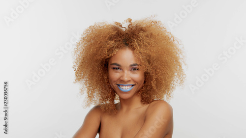 Mixed Race Black Blonde Model With Curly Hair Happy Smiling Black