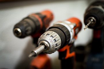 Battery Drill Set orange and black seen close up blurred background